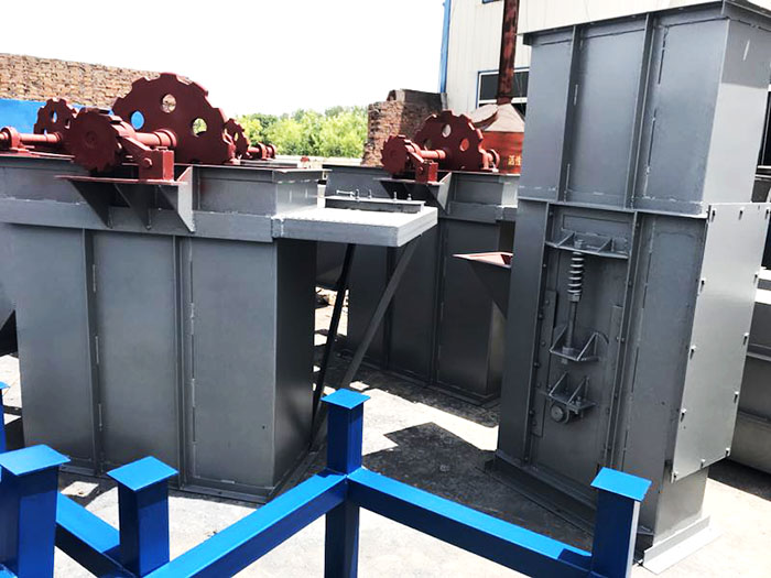 板鏈斗式提升機(jī)底部積料漏粉現(xiàn)場改造方案圖解